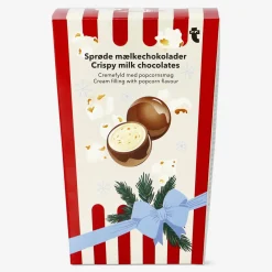 Flying Tiger Mjölkchokladbollar med mjölkfyllning och popcorn^ Choklad