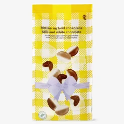 Flying Tiger Vita chokladägg med hasselnötskräm och flingor^ Choklad